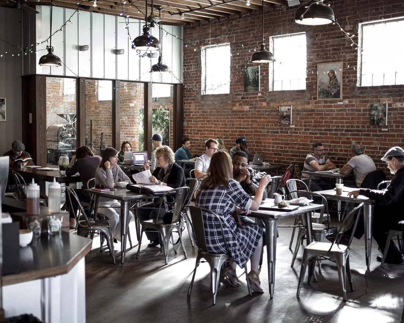People meeting in a bright café